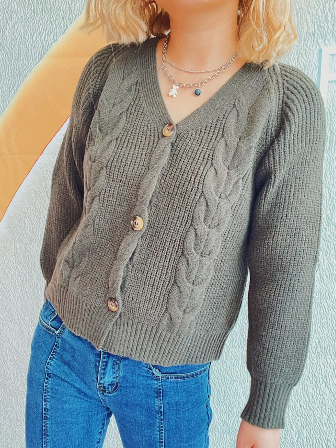 Cable-Knit V-Neck Cardigan with Button Closure and Long Sleeves