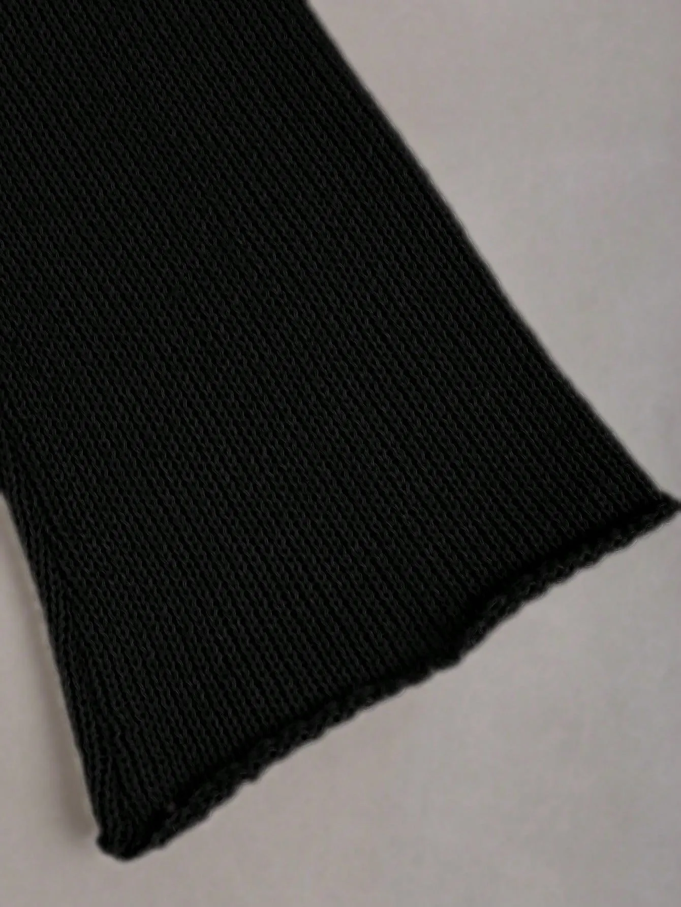 Chaqueta de punto corta con mangas de campana