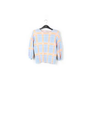 Light blue puffed sleeve knitted top with check motif