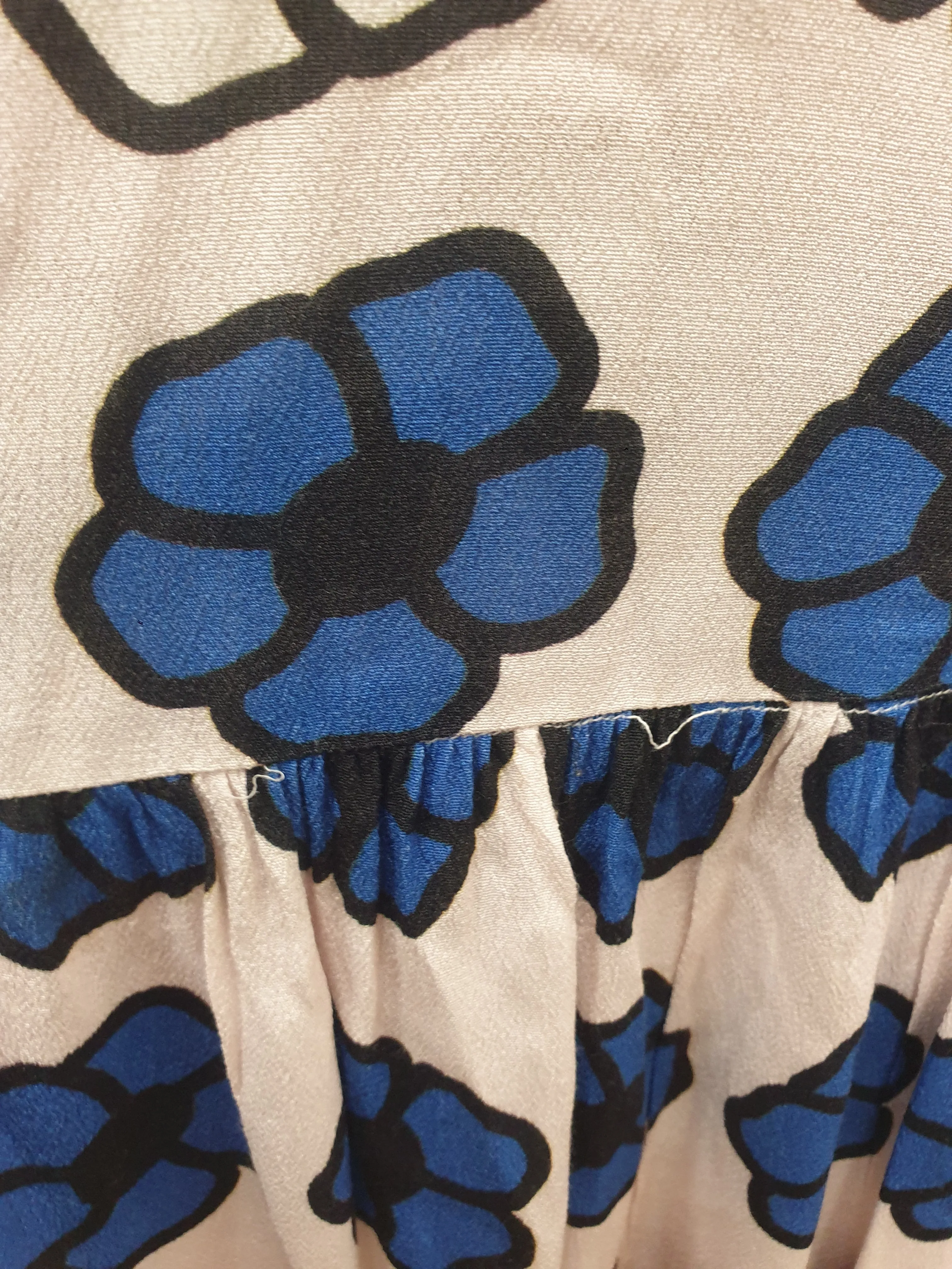 Obus cream dress with cute flower print size 0  (huge fit, fits up to large 10)