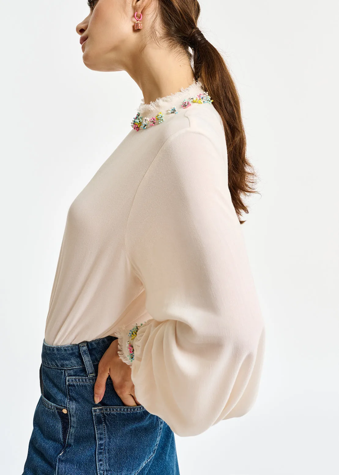Off-white high neck top with bead embellishments
