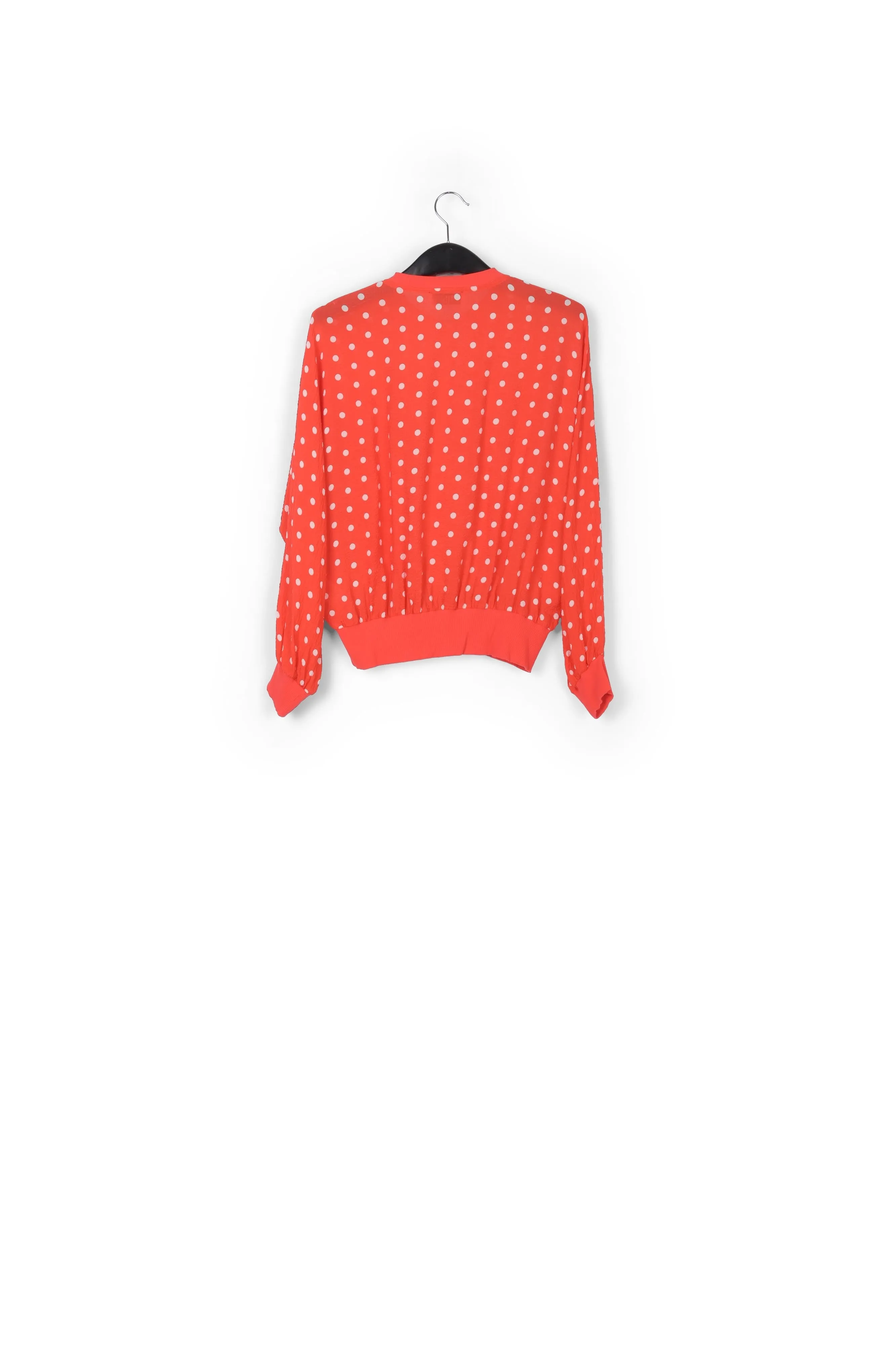 Red and white polka-dot loose-fit top