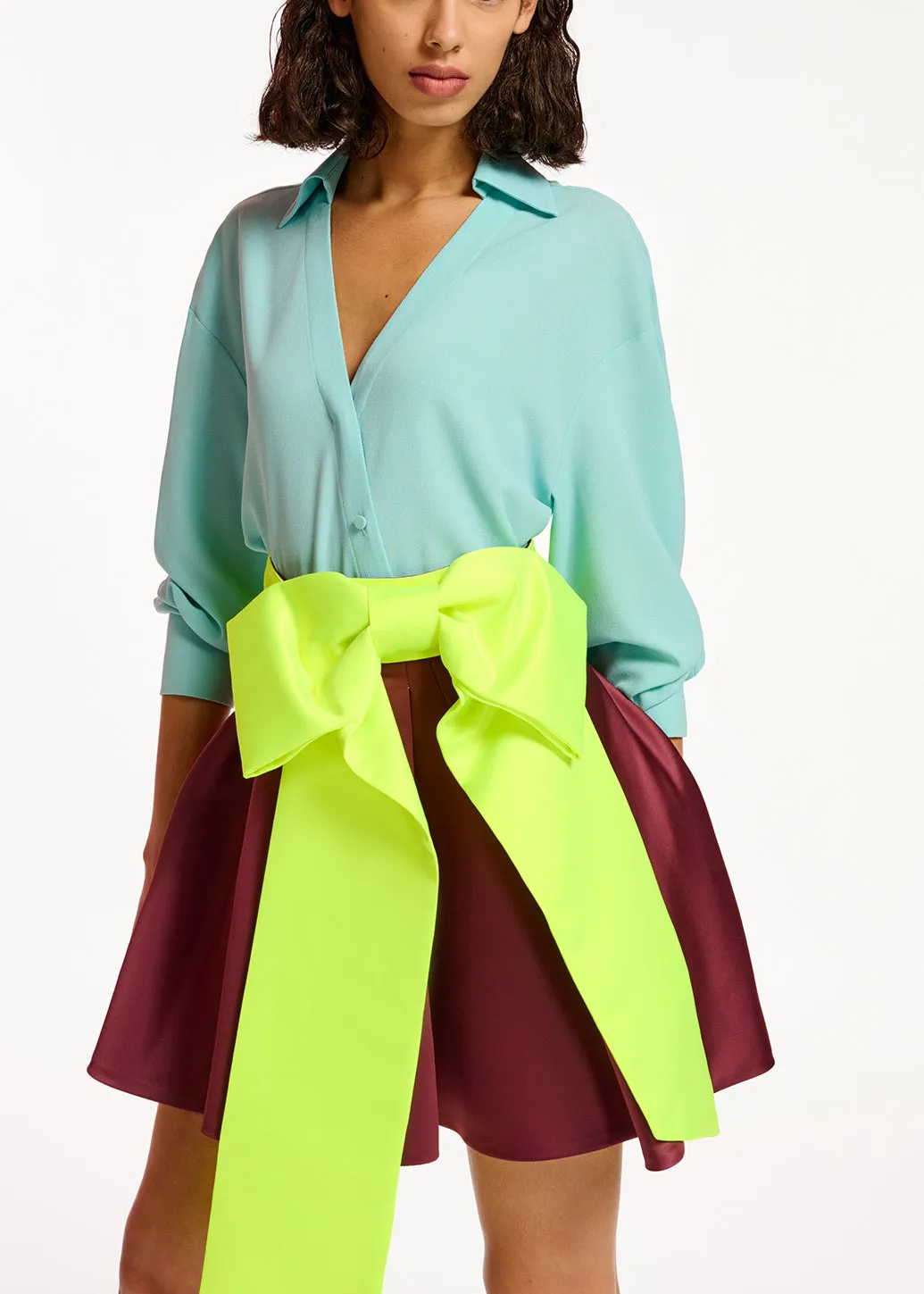 Turquoise V-neck shirt