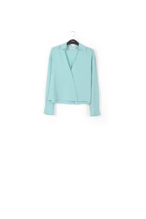 Turquoise V-neck shirt